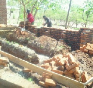 Building new latrines for SOWTech at Namisu